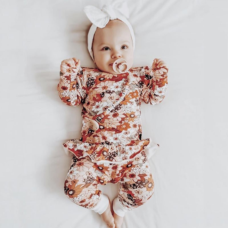 Ava's lily loving floral romper
